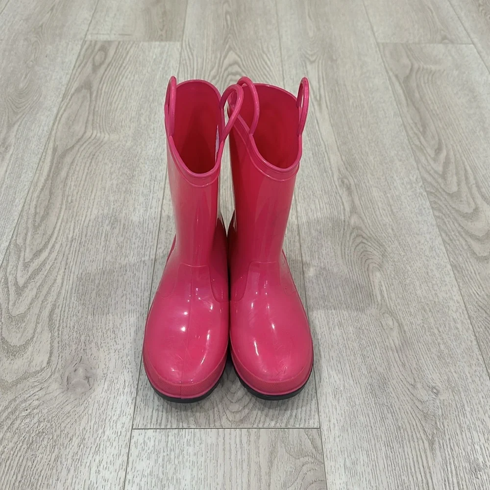 Pink rain boots